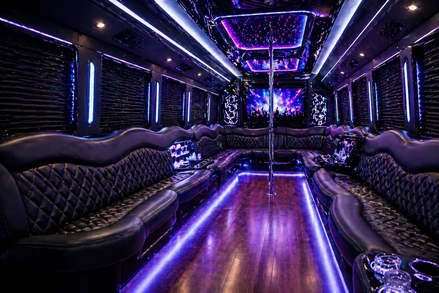 Party bus interior with LED lighting and lounge seating